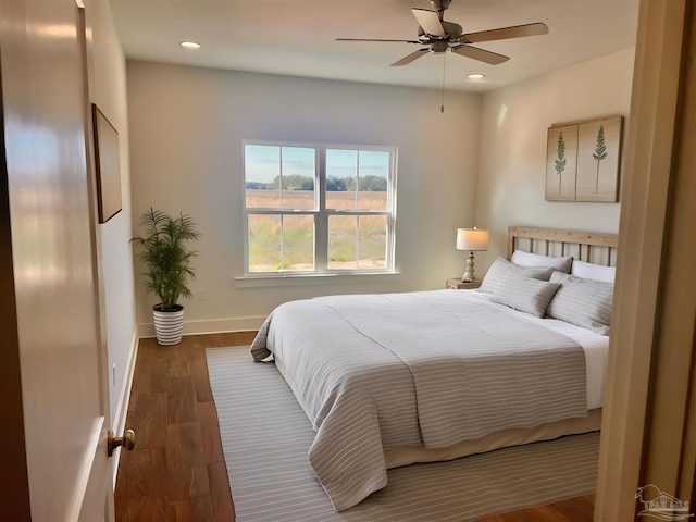4420 Russell Elliott Rd, Jay, FL 32565 - bedroom with baseboards, recessed lighting, ceiling fan, and wood finished floors