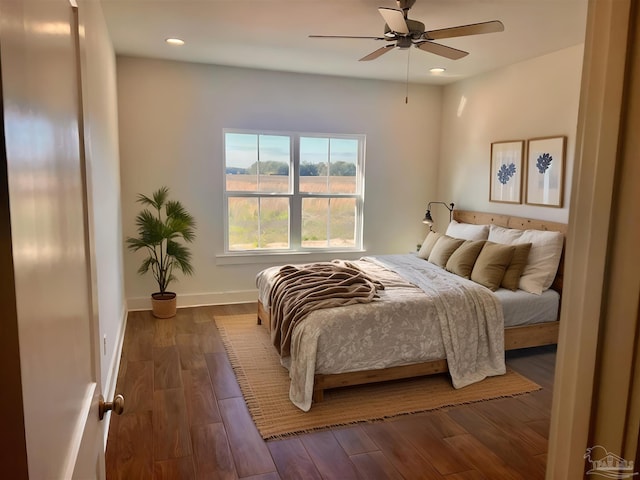 4420 Russell Elliott Rd, Jay, FL 32565 - bedroom featuring recessed lighting, baseboards, dark wood-style flooring, and a ceiling fan