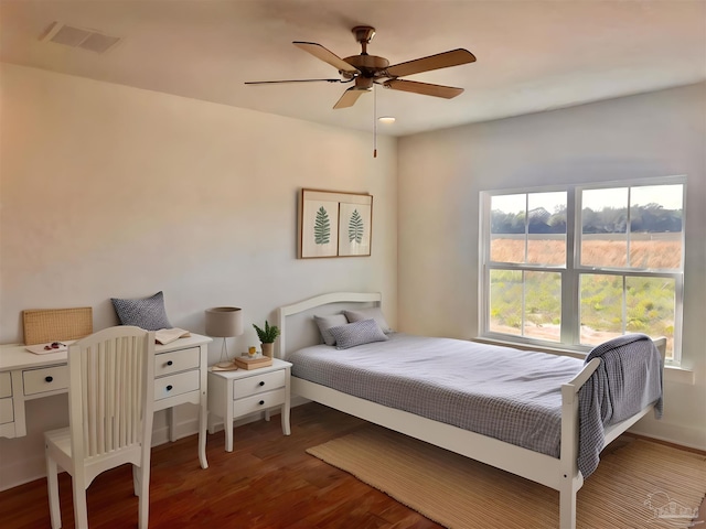 4420 Russell Elliott Rd, Jay, FL 32565 - bedroom featuring wood finished floors, baseboards, and ceiling fan