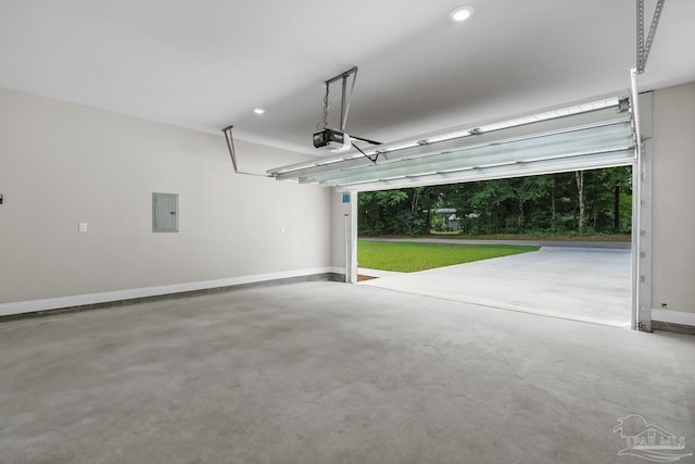 4420 Russell Elliott Rd, Jay, FL 32565 - garage with electric panel, a garage door opener, baseboards, and recessed lighting