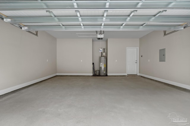 4420 Russell Elliott Rd, Jay, FL 32565 - garage featuring electric water heater, electric panel, baseboards, and a garage door opener