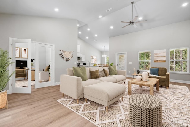 4420 Russell Elliott Rd, Jay, FL 32565 - living room featuring high vaulted ceiling, baseboards, light wood-style flooring, ceiling fan, and recessed lighting