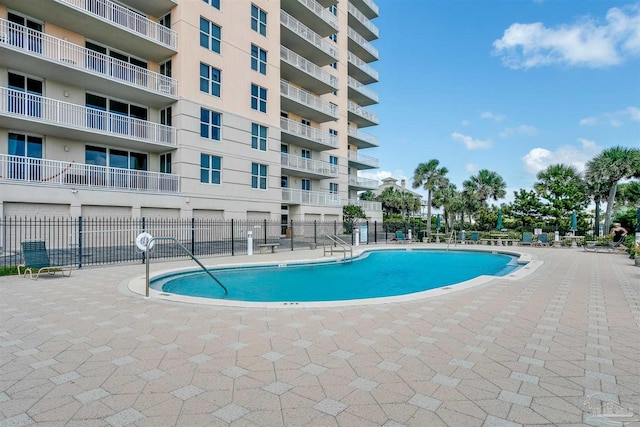 view of pool featuring a patio area