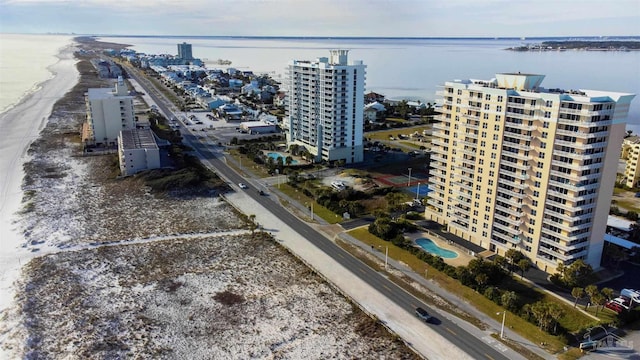 aerial view with a view of the beach and a water view