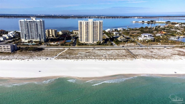 bird's eye view with a beach view and a water view