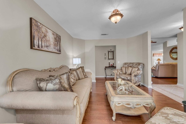 living room with wood-type flooring