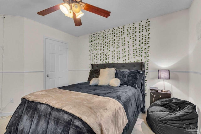 bedroom featuring ceiling fan