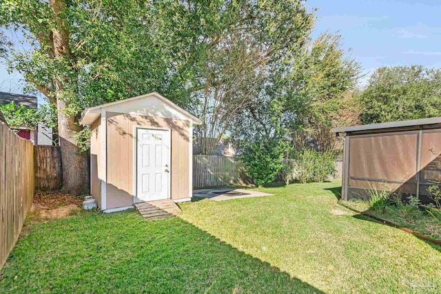 view of yard with a storage shed