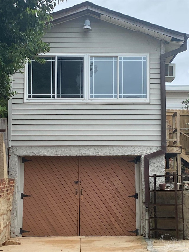 exterior space featuring wooden walls