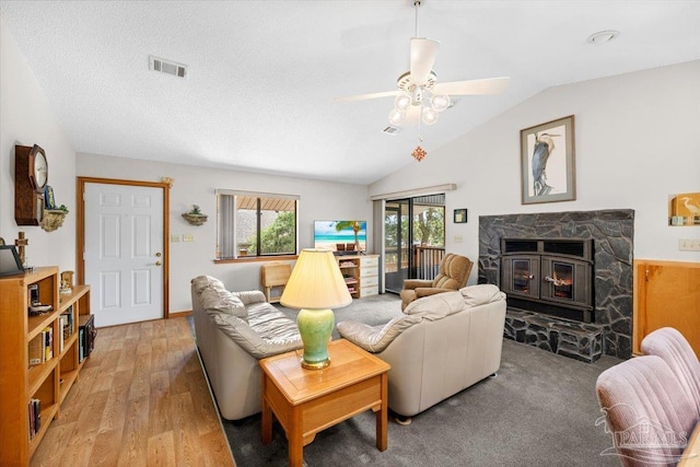 1948 Tanbark Dr, Milton, FL 32583 - living area featuring vaulted ceiling, a ceiling fan, and light wood-style floors