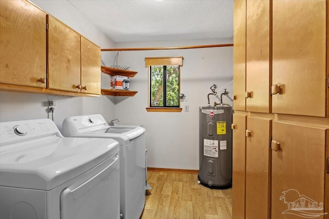 1948 Tanbark Dr, Milton, FL 32583 - laundry area with water heater, cabinet space, separate washer and dryer, light wood-type flooring, and baseboards