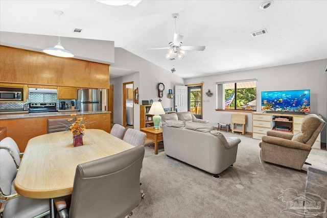 1948 Tanbark Dr, Milton, FL 32583 - living area with vaulted ceiling, light colored carpet, and ceiling fan