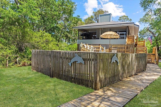 1948 Tanbark Dr, Milton, FL 32583 - view of grassy yard featuring stairway and a deck
