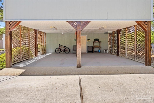 1948 Tanbark Dr, Milton, FL 32583 - view of patio featuring a carport