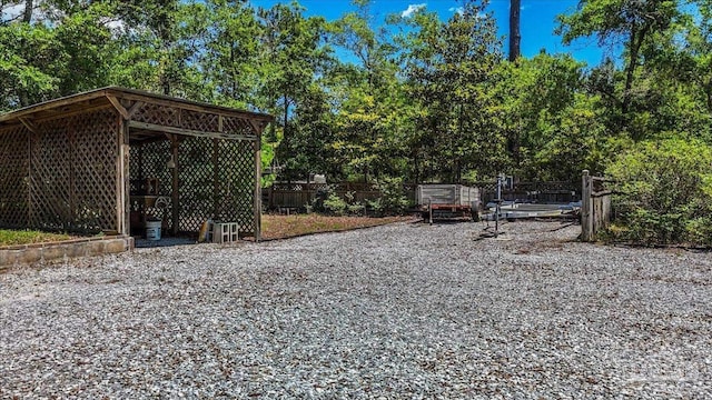 1948 Tanbark Dr, Milton, FL 32583 - view of yard featuring fence and view of wooded area