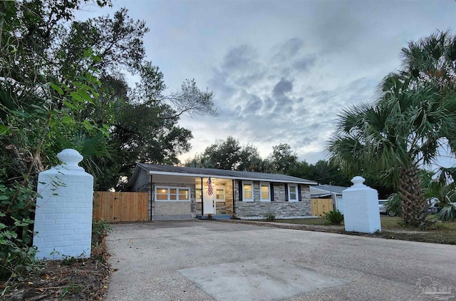 ranch-style house featuring a porch