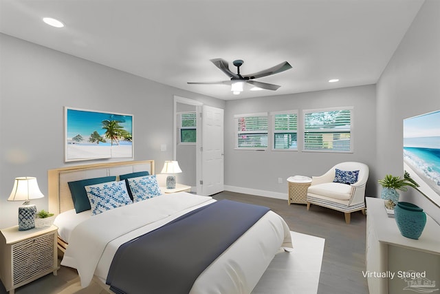 bedroom with wood-type flooring and ceiling fan