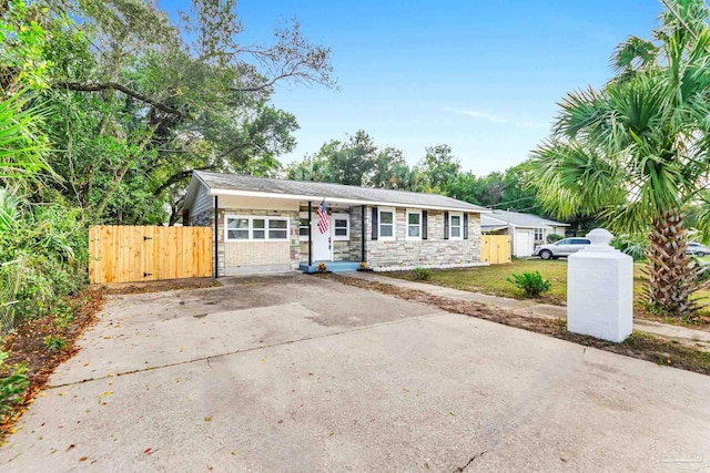 single story home with a garage