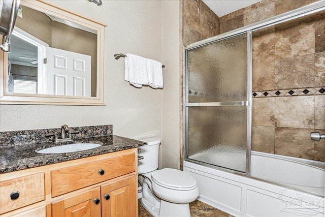 1150 Ft Pickens Rd Unit C7, Pensacola Beach, FL 32561 - full bath with toilet, bath / shower combo with glass door, and vanity