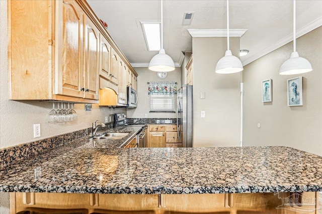 1150 Ft Pickens Rd Unit C7, Pensacola Beach, FL 32561 - kitchen with a sink, stainless steel appliances, crown molding, a peninsula, and a kitchen breakfast bar
