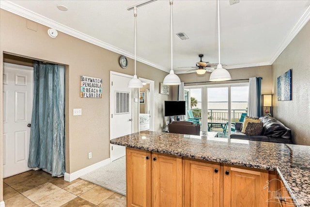 1150 Ft Pickens Rd Unit C7, Pensacola Beach, FL 32561 - kitchen with open floor plan, a ceiling fan, ornamental molding, dark stone countertops, and baseboards