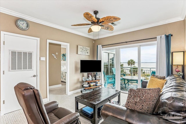 1150 Ft Pickens Rd Unit C7, Pensacola Beach, FL 32561 - carpeted living room with ceiling fan, crown molding, and baseboards