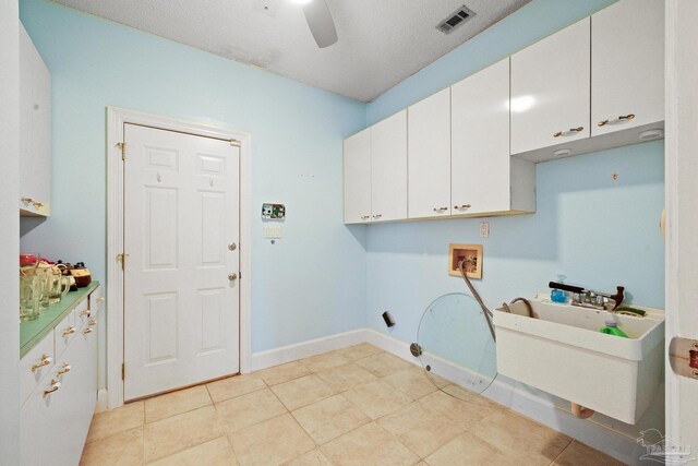 2715 Masters Blvd, Navarre, FL 32566 - washroom with cabinet space, hookup for a washing machine, and a ceiling fan