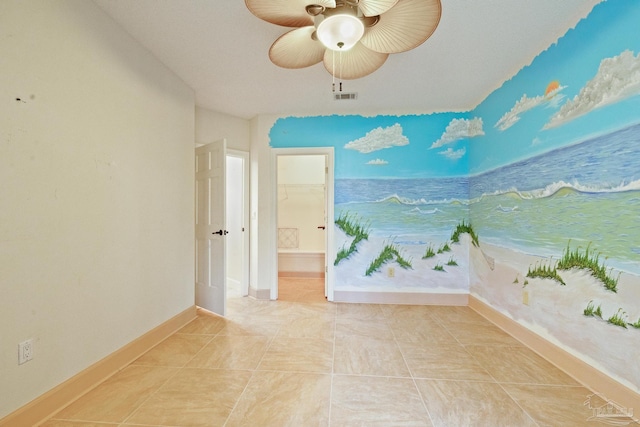 empty room featuring ceiling fan