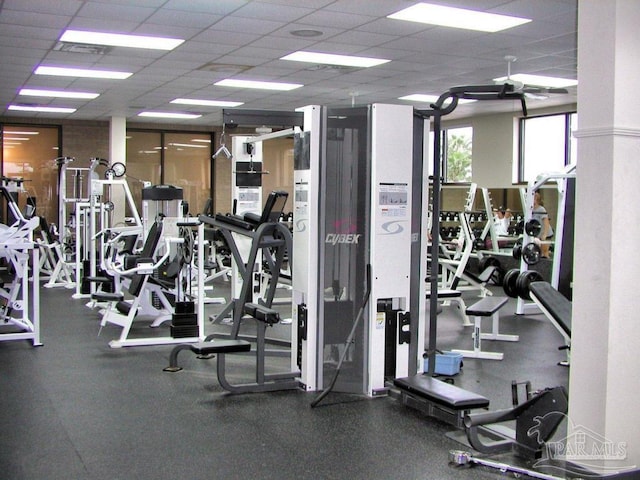 2715 Masters Blvd, Navarre, FL 32566 - workout area with a paneled ceiling and a ceiling fan
