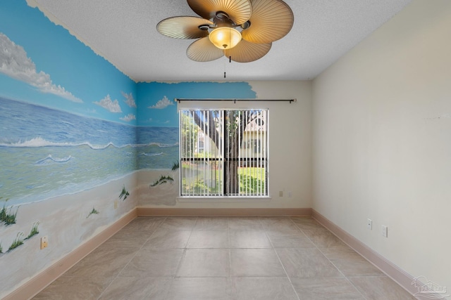 2715 Masters Blvd, Navarre, FL 32566 - spare room with a ceiling fan and a textured ceiling