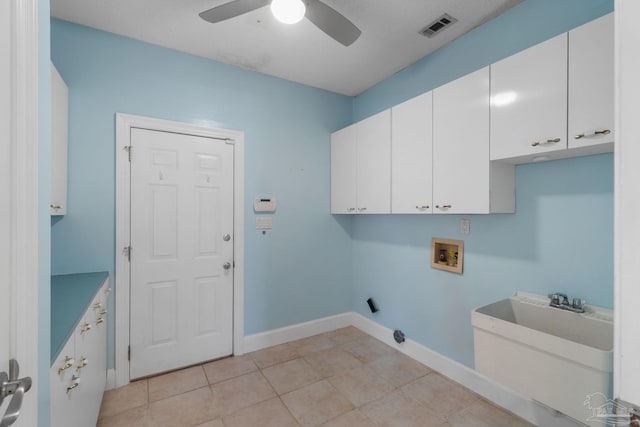 2715 Masters Blvd, Navarre, FL 32566 - laundry room featuring cabinet space, hookup for a washing machine, ceiling fan, and light tile patterned flooring