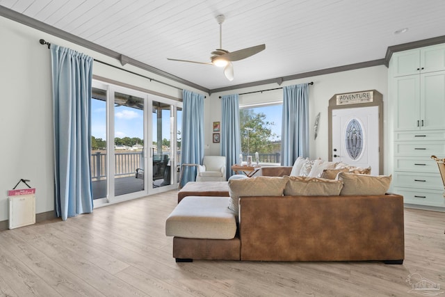 7730 Sunfish Ln, Milton, FL 32583 - living room with ceiling fan, light wood-style floors, and ornamental molding