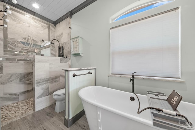 7730 Sunfish Ln, Milton, FL 32583 - full bathroom featuring a soaking tub, wood finished floors, toilet, and walk in shower