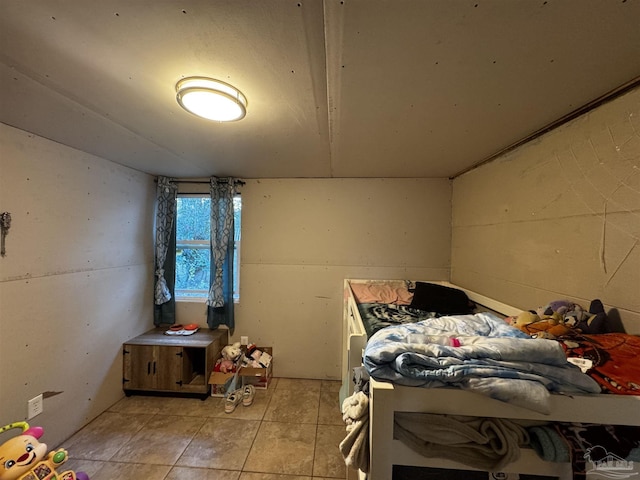 bedroom featuring light tile patterned floors