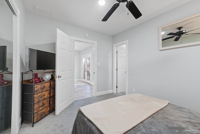 bedroom with ceiling fan and carpet floors