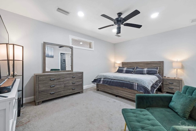 carpeted bedroom with ceiling fan