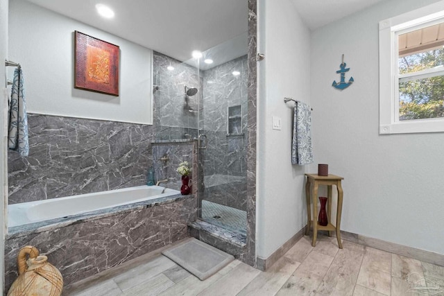 bathroom with independent shower and bath