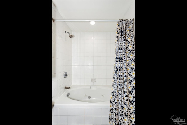 full bath with a combined bath / shower with jetted tub