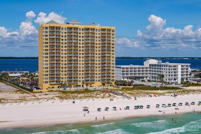 bird's eye view featuring a beach view and a water view