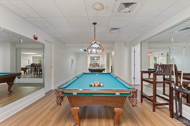 playroom featuring a drop ceiling, pool table, and light wood-type flooring