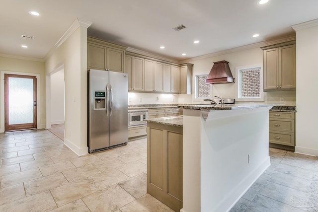 kitchen with premium range hood, a center island with sink, light stone countertops, ornamental molding, and stainless steel appliances