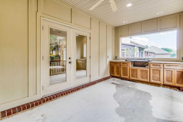 interior space featuring french doors and a healthy amount of sunlight