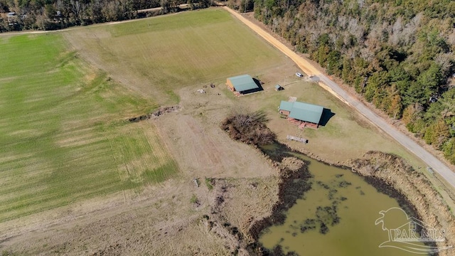 drone / aerial view with a rural view and a water view