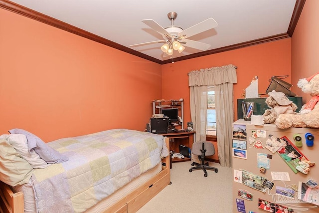 carpeted bedroom with ceiling fan and ornamental molding