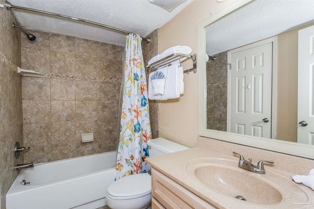 bathroom with shower / bath combo, toilet, a textured ceiling, and vanity