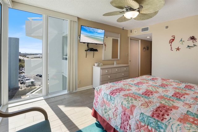 13753 Perdido Key Dr Unit 608, Pensacola, FL 32507 - bedroom with visible vents, access to exterior, and ceiling fan