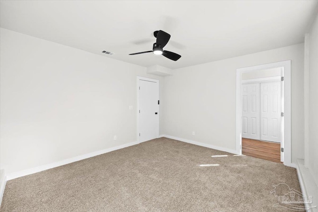 unfurnished bedroom featuring ceiling fan, carpet floors, and a closet