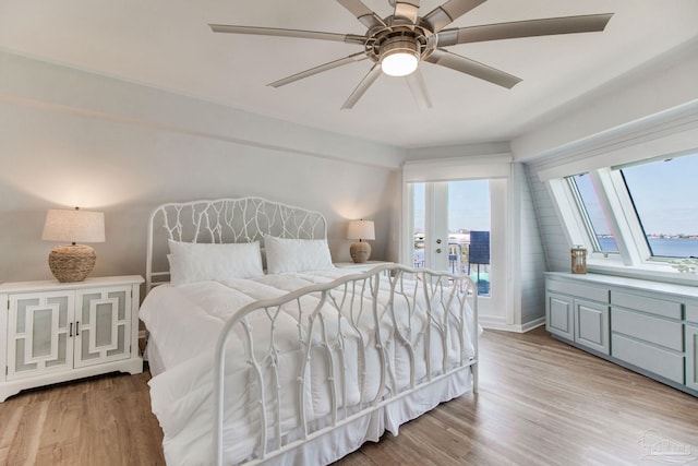 bedroom featuring light wood-type flooring and ceiling fan