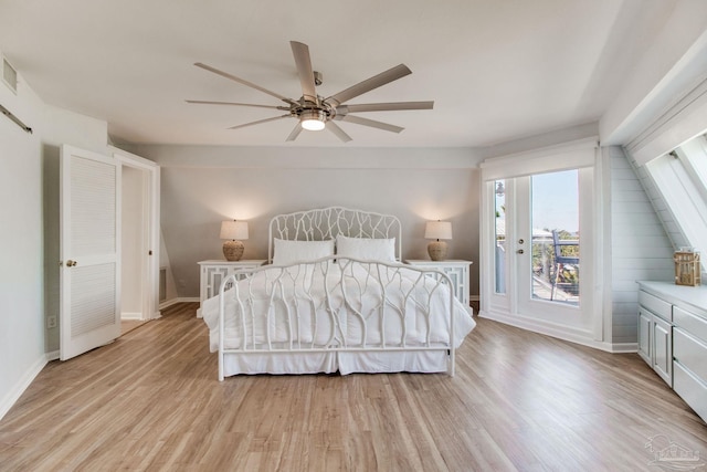 bedroom featuring light wood-style flooring, baseboards, ceiling fan, and access to outside