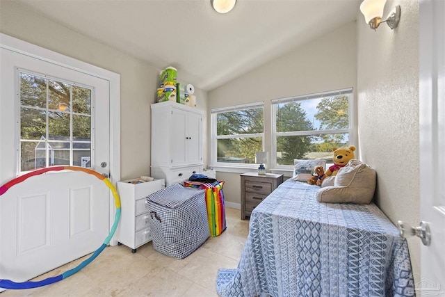 5607 Fairview Dr, Pensacola, FL 32505 - bedroom featuring lofted ceiling and light tile patterned floors
